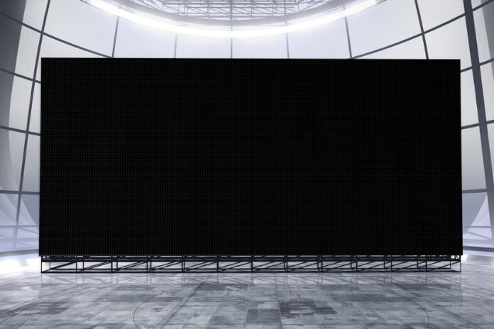 videowall que son Un videowall en el que se muestra información corporativa relacionada con una empresa